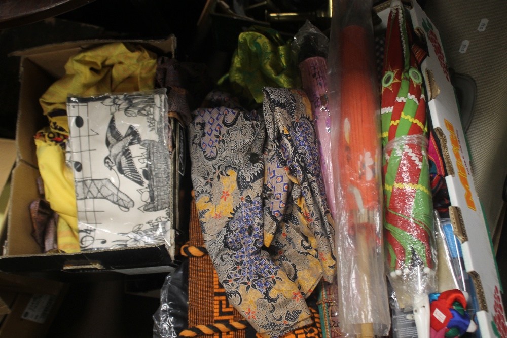 A TRAY OF ASSORTED LINEN AND PARASOLS