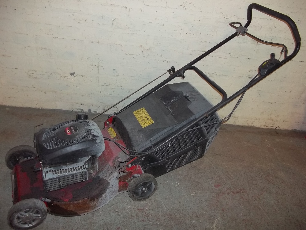 A PETROL LAWN MOWER