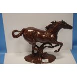 A COLD PAINTED BRASS HORSE FIGURE