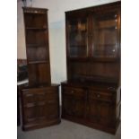 AN ERCOL DRESSER AND MATCHING CORNER DISPLAY UNIT - DARK WOOD