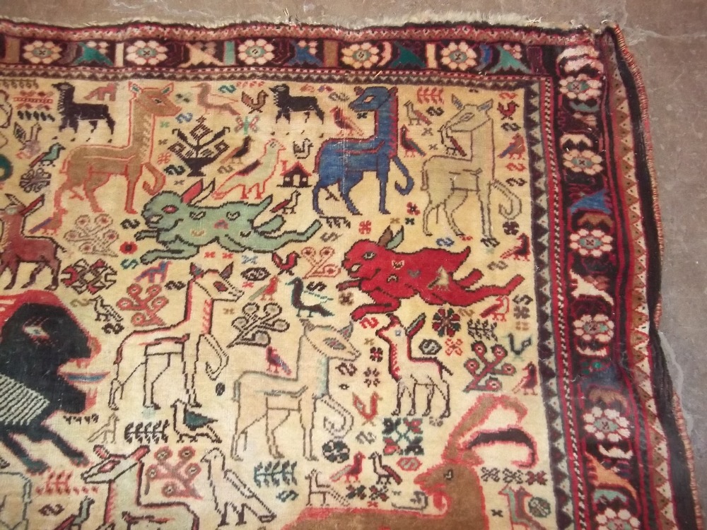 A HAND MADE RUG DEPICTING PREHISTORIC ANIMALS, SIZE 245 X 177 CM - Image 7 of 13