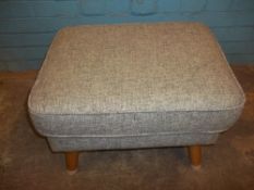 A G-PLAN VINTAGE STYLE FOOTSTOOL AND A GLASS TOPPED RATTAN WICKER TABLE