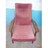 A VINTAGE TEAK RECLINER ARMCHAIR