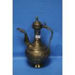 A BRAS ARABIC COFFEE POT WITH RAISED DECORATION