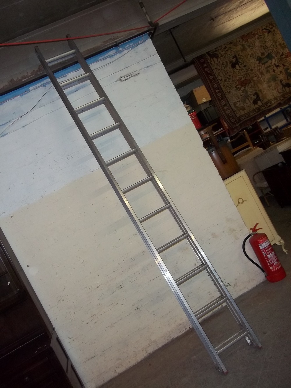 A DOUBLE ALUMINIUM LADDER