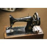 A CASED SINGER SEWING MACHINE
