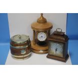 TWO CLOCKS TOGETHER WITH A LIDDED BARREL