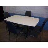 A WHITE AND CHROME DINING TABLE WITH FOUR GREY CHROME CHAIRS