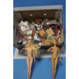 A BOX OF COSTUME JEWELLERY AND TWO 12" DOLLS