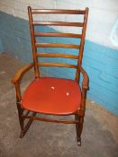 A RETRO SOLID BEECHWOOD ROCKING CHAIR