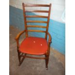 A RETRO SOLID BEECHWOOD ROCKING CHAIR