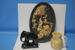 A CONTINENTAL STYLE OVAL PLATE TOGETHER WITH A BURSLEY WARE CHARLOTTE RHEAD JUG AND A CERAMIC FIGURE