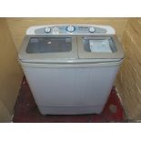 A THOMPSON TWIN TUB WASHING MACHINE