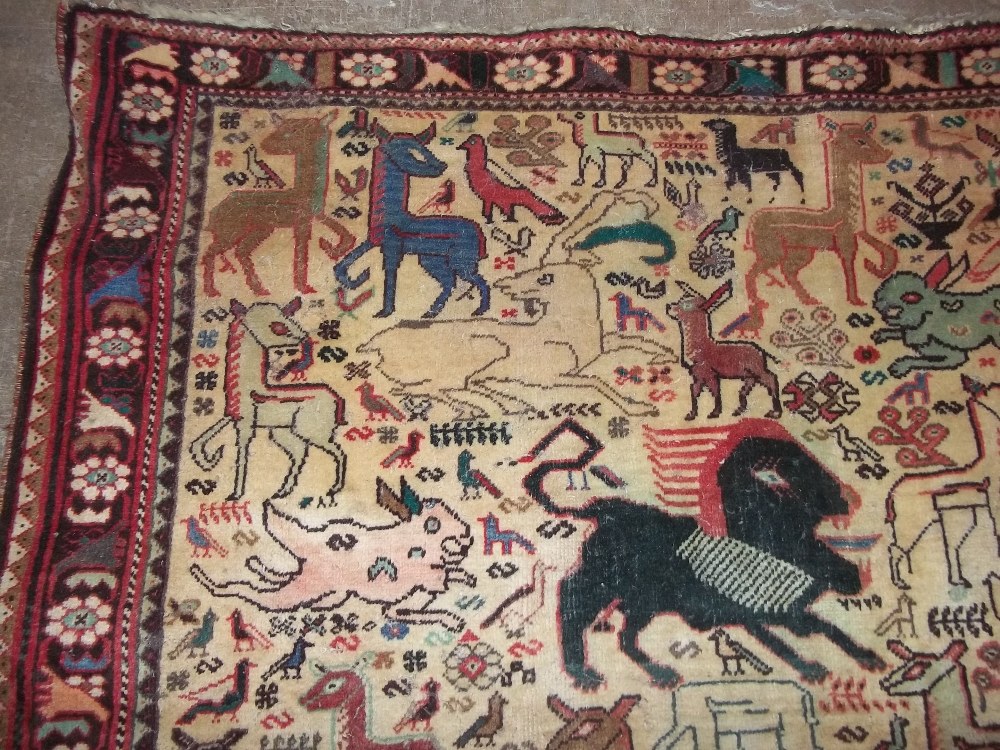 A HAND MADE RUG DEPICTING PREHISTORIC ANIMALS, SIZE 245 X 177 CM - Image 6 of 13