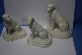 THREE BELLEEK LIMITED EDITION IRISH WOLFHOUNDS, TWO WITH BLACK STAMPS AND ONE WITH RED