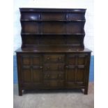 A DARK OAK ERCOL DRESSER