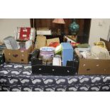 FOUR TRAYS OF SUNDRIES TO INCLUDE VINTAGE BAGS, 1950S / 60S BOXED HOUSEHOLD ITEMS ETC.