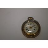 A CONTINENTAL YELLOW METAL LADIES FOB WATCH, MARKED 18K, FANCY OPEN DIAL WITH BLACK ROMAN NUMERAL