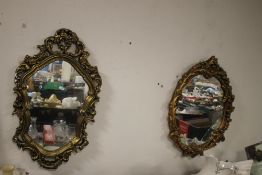 TWO GILT FRAMED WALL MIRRORS
