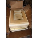 A BOX OF PICTURE FRAMING MOUNTS