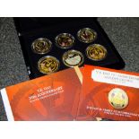 A CASED SET OF SIX GOLD PLATED V E DAY 70TH ANNIVERSARY GOLDEN CROWN COLLECTION COINS