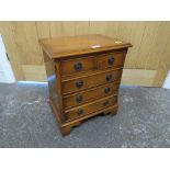 A SMALL REPRODUCTION YEW WOOD FIVE DRAWER CHEST H 51 cm, W 43 cm