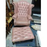 A PINK UPHOLSTERED WINGBACK ARMCHAIR & STOOL A/F