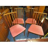 A SET OF FOUR RETRO DINING CHAIRS