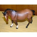 A MATTE FINISH BESWICK HORSE FIGURE