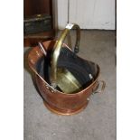 A COPPER COAL BUCKET WITH BRASS HANDLES