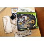 A BOX OF ASSORTED COSTUME JEWELLERY