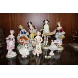 A COLLECTION OF CONTINENTAL CERAMIC FIGURES, TO INCLUDE A FIGURE GROUP OF A MAN AND WOMAN WITH