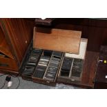 THREE BOXES OF ANTIQUE MAGIC LANTERN SLIDES