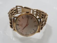 A GENTS VINTAGE OMEGA AUTOMATIC WRISTWATCH ON 9 CT GOLD EXPANDABLE STRAP