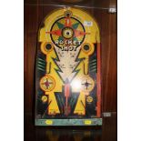 A VINTAGE WOOD AND METAL AMERICAN BAGATELLE GAME 'LINDSTOMS ROCKET SHOT'