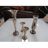 A COLLECTION OF HALLMARKED SILVER AND WHITE METAL VASES ETC. (5)