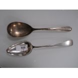 A WHITE METAL SERVING SPOON STAMPED ONEIDA STERLING HEIRESS, TOGETHER WITH ANOTHER