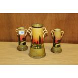 A SET OF THREE ROYAL DOULTON TWIN HANDLED VASES D3416