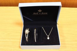 A BELL AND ROSE WATCH, BRACELET AND NECKLACE SET, IN BOX