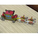 A VINTAGE TIN PLATE ROYAL HORSE DRAWN CARRIAGE