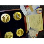 FOUR CASED 'CONCORDE GIANTS' GOLD PLATED OVERSIZED COINS WITH CERTIFICATE