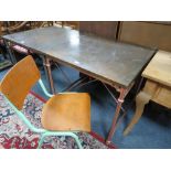 A MODERN INDUSTRIAL STYLE METAL TOPPED TABLE ON CASTORS, H 76 cm, W 80 cm, TOGETHER WITH A CHAIR