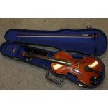 A CASED METROPOLE TWO PIECE BACK VIOLIN AND BOW - MADE IN SAXONY