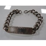 A HALLMARKED SILVER I.D. BRACELET