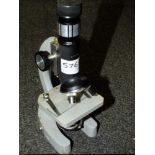 A REGENT MICROSCOPE TOGETHER WITH A HERON 10X20 FIELD MONOCULAR
