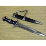 A REPRODUCTION NAZI DAGGER WITH SCABBARD AND HANGER