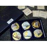 SIX GOLD PLATED ENAMELLED COMMEMORATIVE COINS WITH CERTIFICATES