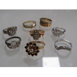 A COLLECTION OF MODERN DRESS RINGS TO INCLUDE SILVER EXAMPLES