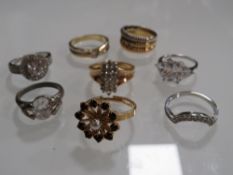 A COLLECTION OF MODERN DRESS RINGS TO INCLUDE SILVER EXAMPLES