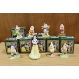 A COLLECTION OF ROYAL DOULTON SNOW WHITE AND THE SEVEN DWARVES FIGURES - 'GRUMPY', 'SLEEPY', HAPPY',